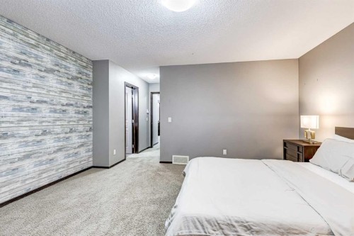 9 Cranwell Court Se, Calgary, AB - Indoor Photo Showing Bedroom