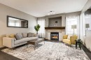 9 Cranwell Court Se, Calgary, AB  - Indoor Photo Showing Living Room With Fireplace 