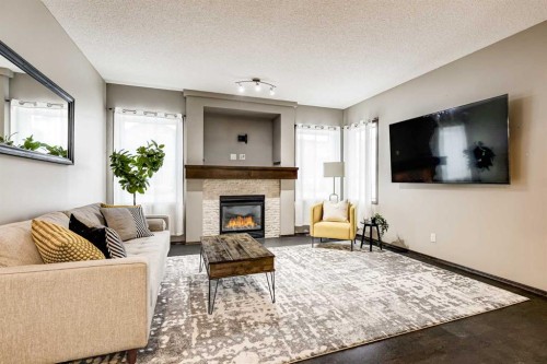 9 Cranwell Court Se, Calgary, AB - Indoor Photo Showing Living Room With Fireplace