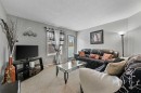 165 Saddlebrook Point Ne, Calgary, AB  - Indoor Photo Showing Living Room 