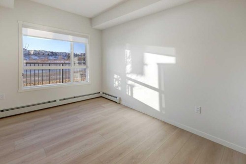 124-245 Edith Place Nw, Calgary, AB - Indoor Photo Showing Other Room