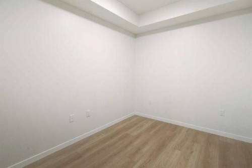 118-245 Edith Place Nw, Calgary, AB - Indoor Photo Showing Other Room