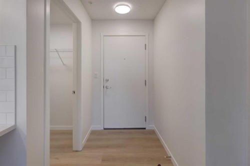 118-245 Edith Place Nw, Calgary, AB - Indoor Photo Showing Other Room