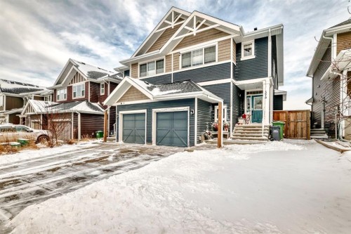 570 River Heights Crescent, Cochrane, AB - Outdoor With Facade