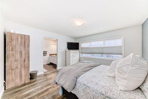 570 River Heights Crescent, Cochrane, AB - Indoor Photo Showing Bedroom