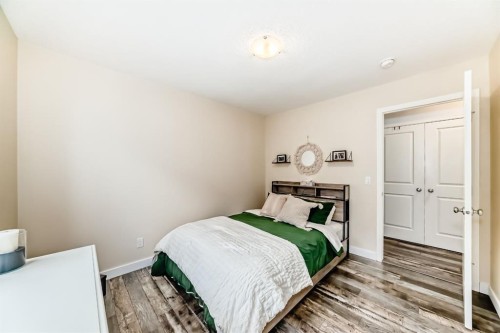 570 River Heights Crescent, Cochrane, AB - Indoor Photo Showing Bedroom