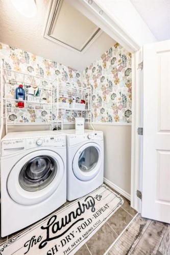 570 River Heights Crescent, Cochrane, AB - Indoor Photo Showing Laundry Room