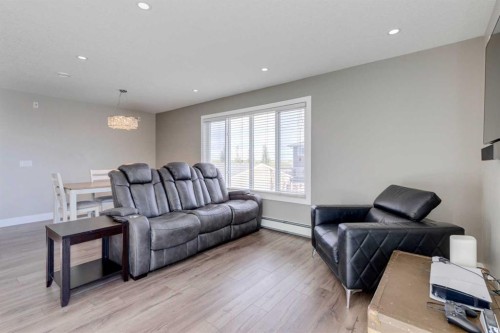 123 Marquis Green Se, Calgary, AB - Indoor Photo Showing Living Room