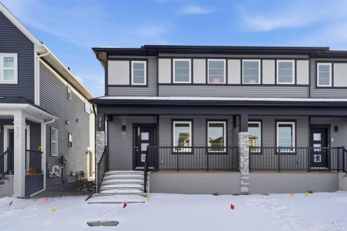 313 Cobblestone Gate Sw, Airdrie, AB - Outdoor With Deck Patio Veranda With Facade