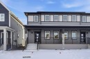 313 Cobblestone Gate Sw, Airdrie, AB  - Outdoor With Deck Patio Veranda With Facade 