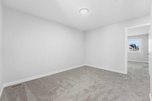 313 Cobblestone Gate Sw, Airdrie, AB - Indoor Photo Showing Other Room