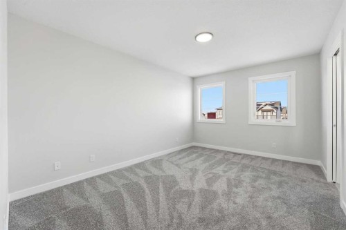 313 Cobblestone Gate Sw, Airdrie, AB - Indoor Photo Showing Other Room
