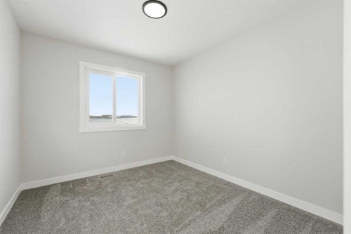 313 Cobblestone Gate Sw, Airdrie, AB - Indoor Photo Showing Other Room