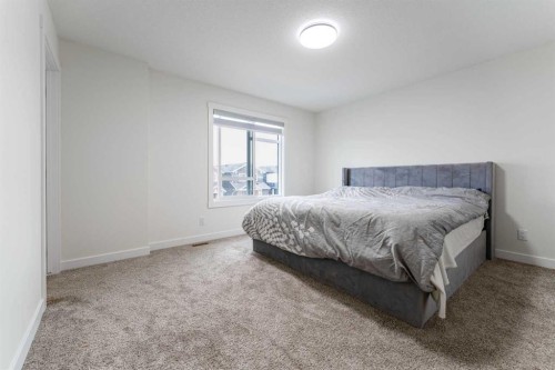 3222 Chinook Winds Drive Sw, Airdrie, AB - Indoor Photo Showing Bedroom
