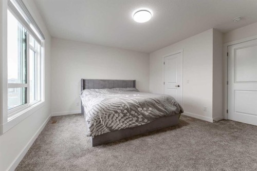 3222 Chinook Winds Drive Sw, Airdrie, AB - Indoor Photo Showing Bedroom