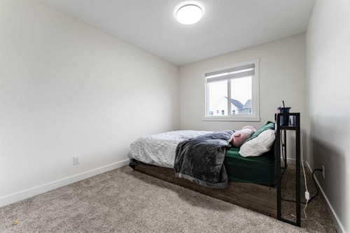 3222 Chinook Winds Drive Sw, Airdrie, AB - Indoor Photo Showing Bedroom