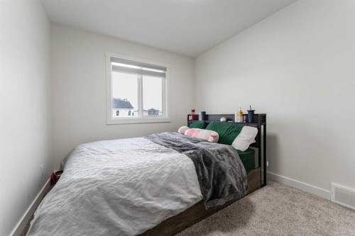 3222 Chinook Winds Drive Sw, Airdrie, AB - Indoor Photo Showing Bedroom