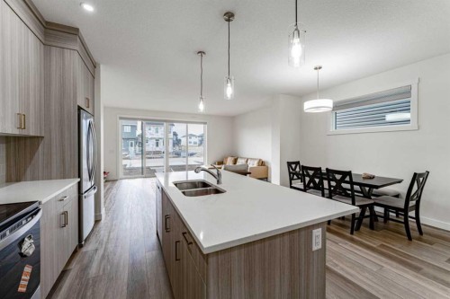3222 Chinook Winds Drive Sw, Airdrie, AB - Indoor Photo Showing Kitchen With Double Sink