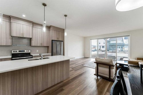 3222 Chinook Winds Drive Sw, Airdrie, AB - Indoor Photo Showing Kitchen With Upgraded Kitchen