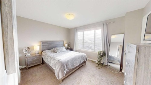 165 Panatella Square Nw, Calgary, AB - Indoor Photo Showing Bedroom