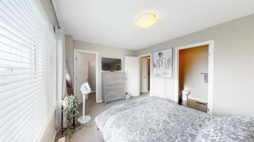165 Panatella Square Nw, Calgary, AB - Indoor Photo Showing Bedroom