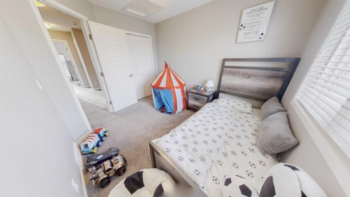165 Panatella Square Nw, Calgary, AB - Indoor Photo Showing Bedroom