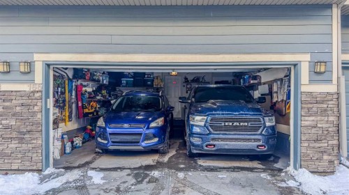 165 Panatella Square Nw, Calgary, AB - Indoor Photo Showing Garage