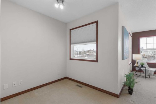 1409 Kings Heights Boulevard Se, Airdrie, AB - Indoor Photo Showing Other Room