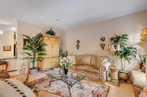 3206-3206 Lake Fraser Court Se, Calgary, AB - Indoor Photo Showing Living Room