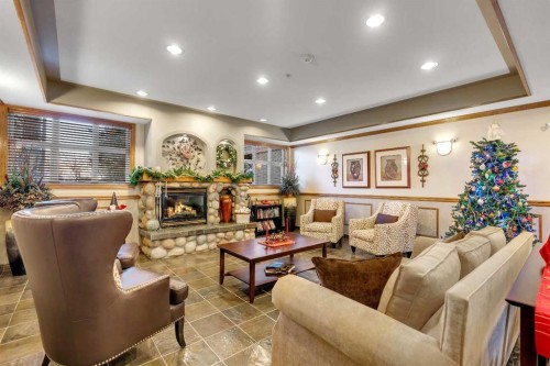 3206-3206 Lake Fraser Court Se, Calgary, AB - Indoor Photo Showing Other Room With Fireplace