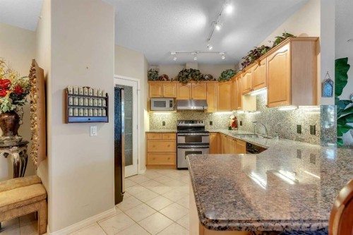 3206-3206 Lake Fraser Court Se, Calgary, AB - Indoor Photo Showing Kitchen With Stainless Steel Kitchen