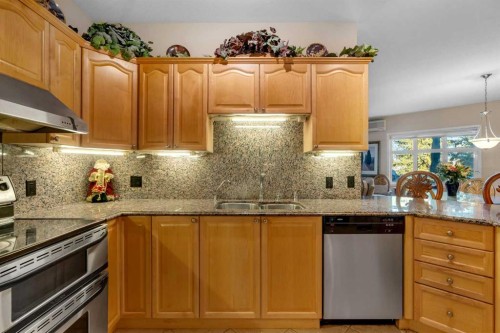 3206-3206 Lake Fraser Court Se, Calgary, AB - Indoor Photo Showing Kitchen With Stainless Steel Kitchen With Double Sink