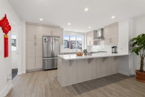 317 Masters Road Se, Calgary, AB - Indoor Photo Showing Kitchen With Upgraded Kitchen