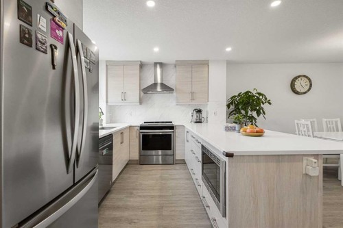 317 Masters Road Se, Calgary, AB - Indoor Photo Showing Kitchen With Upgraded Kitchen