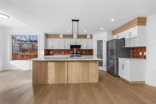 213 Tuscany  Ravine Close Nw, Calgary, AB - Indoor Photo Showing Kitchen