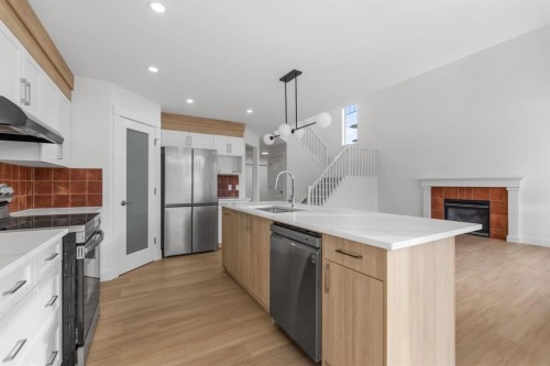 213 Tuscany  Ravine Close Nw, Calgary, AB - Indoor Photo Showing Kitchen With Upgraded Kitchen