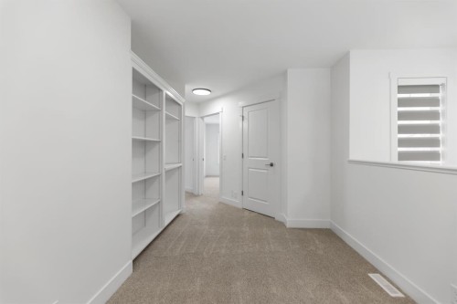 213 Tuscany  Ravine Close Nw, Calgary, AB - Indoor Photo Showing Other Room