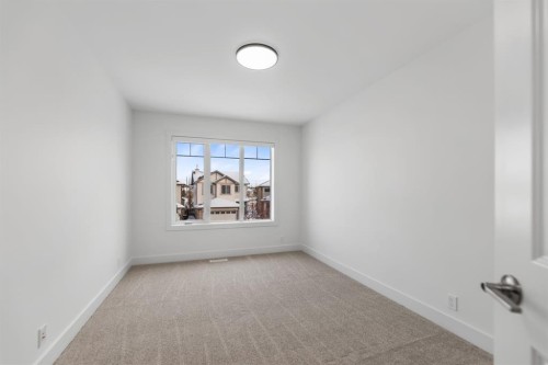 213 Tuscany  Ravine Close Nw, Calgary, AB - Indoor Photo Showing Other Room