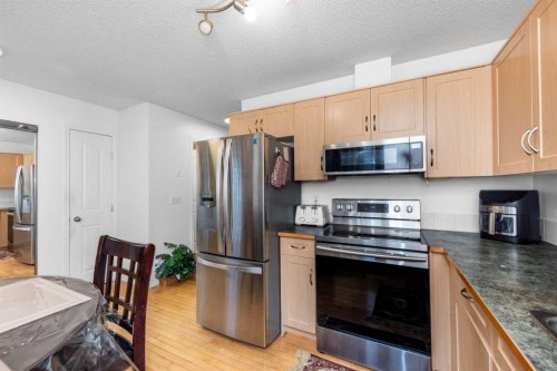 1001-111 Tarawood Lane Ne, Calgary, AB - Indoor Photo Showing Kitchen With Stainless Steel Kitchen