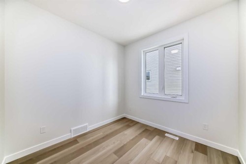1149 Iron Ridge Avenue, Crossfield, AB - Indoor Photo Showing Other Room