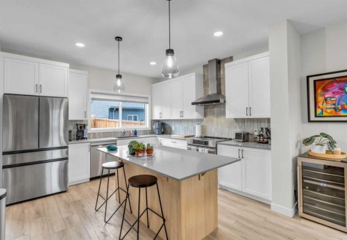315 Wolf Creek Way Se, Calgary, AB - Indoor Photo Showing Kitchen With Upgraded Kitchen