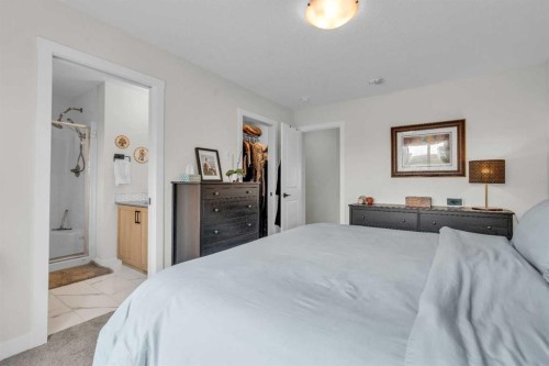 315 Wolf Creek Way Se, Calgary, AB - Indoor Photo Showing Bedroom