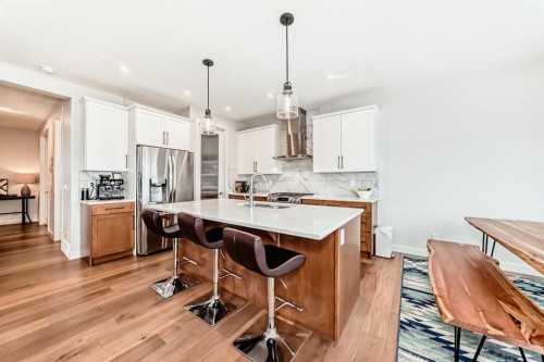 280 Precedence View, Cochrane, AB - Indoor Photo Showing Kitchen With Upgraded Kitchen