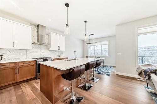 280 Precedence View, Cochrane, AB - Indoor Photo Showing Kitchen With Upgraded Kitchen