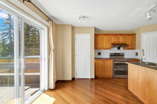 11137 Hidden Valley Drive Nw, Calgary, AB - Indoor Photo Showing Kitchen With Double Sink