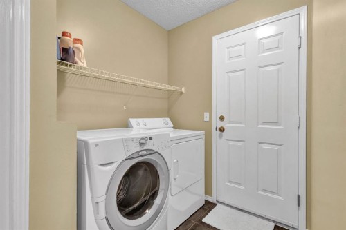 11137 Hidden Valley Drive Nw, Calgary, AB - Indoor Photo Showing Laundry Room