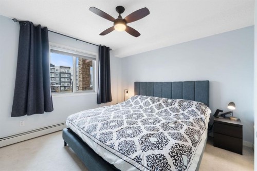 2218-505 Railway Street West, Cochrane, AB - Indoor Photo Showing Bedroom