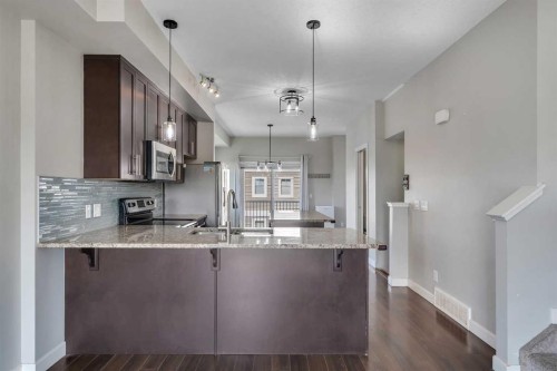 23 Redstone Circle Ne, Calgary, AB - Indoor Photo Showing Kitchen With Upgraded Kitchen