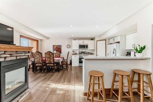 51 Everstone Boulevard Sw, Calgary, AB - Indoor With Fireplace