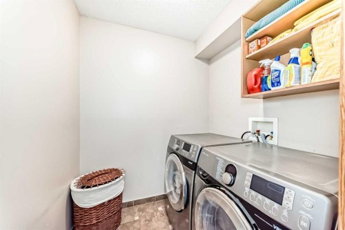 51 Everstone Boulevard Sw, Calgary, AB - Indoor Photo Showing Laundry Room